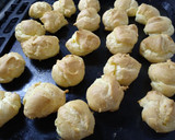 Foto del paso 8 de la receta: Bombas rellenas de dulce de leche y baño de chocolate