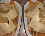 A picture of step 2 of Nachos with Shredded Beef and Cheese.