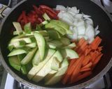 Foto del paso 3 de la receta: Galles napolitanas de pan rallado c/arroz y verduras estilo wok