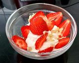 A picture of step 4 of My Healthy Dessert. Greek yogurt & Sliced fresh 🍓+ Nuts.