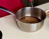 A picture of step 2 of Chocolate biscuit cake.