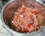 Une image de l'étape 13 de Courgettes et poivrons farcis bœuf, tomates et oignon.
