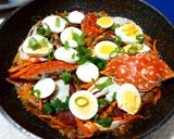 A picture of step 11 of Arroz Intergral a la Valenciana de Mariscos.