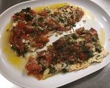 Une image de l'étape 7 de Filets de loup de mer aux tomates, fanes de radis et parmesan.