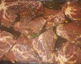 Foto del paso 3 de la receta: Chuleta al horno con yuca