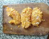 Foto del paso 2 de la receta: Pollo frito con doritos