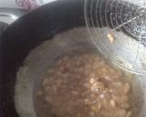 A picture of step 2 of Low-Oil Sweet and Tangy Chivda (Khatta Meetha Chivda).