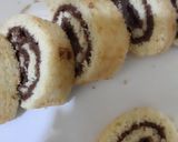 A picture of step 8 of Chocolate vanilla Swiss roll in fry pan.