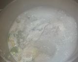 A picture of step 3 of Cook every part - Chicken broth (with some meat) from chicken back/carcass, and wing tips.