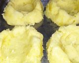 Foto del paso 3 de la receta: Papa rellena con carne molida y lomo embuchado, gratinada con queso