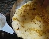 A picture of step 6 of Dominoes style garlic bread.