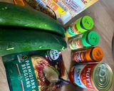 Une image de l'étape 1 de Courgettes farcies au quinoa, parmesan et pignons.