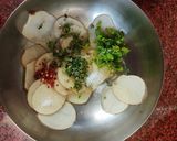 A picture of step 1 of Maaru fritters with tomato carrot salsa.