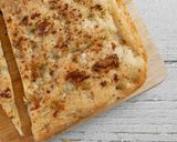 A picture of step 7 of Overnight 89% Hydration Garlic and Rosemary Focaccia.