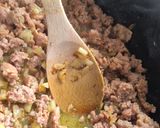 A picture of step 2 of Stuffed Zucchini Gratin in a Dutch Oven.