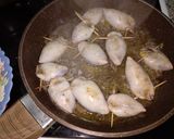 Foto del paso 5 de la receta: Chipirones rellenos de setas, champiñones y langostinos