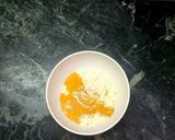 A picture of step 1 of Shahi mango khandvi with Mango rabari.