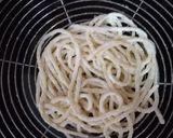 A picture of step 4 of Spaghetti Nest with Drumsticks.