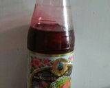 A picture of step 1 of Frozen Muskmelon Pepsicles in RoohAfza.