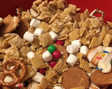 A picture of step 4 of Buddy the elf Chex mix.