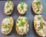 A picture of step 7 of Maggi stuffed jacket potatoes.
