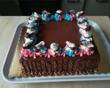 Tort kwadratowy z kolorowymi rozetkami krok przepisu 8 zdjęcie