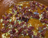 Foto del paso 3 de la receta: Alcachofas frescas al ajillo con jamón Mte