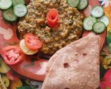 A picture of step 5 of Daal chana palk with roti.