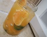 A picture of step 3 of Orange Mojito 🍊.