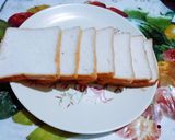 A picture of step 1 of Amul cheese spread vegetable sandwich.