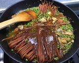 Une image de l'étape 12 de Antichis rouges aux petits pois, champignons et chorizo.