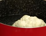 A picture of step 2 of Gobhi musallam.