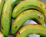A picture of step 1 of Jain special veg Dum Raw Banana.