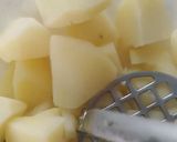 A picture of step 1 of Potatoes Bread.