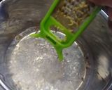 A picture of step 2 of Herbal jaggery tea.