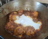 A picture of step 9 of Niramish Aloo Dum.