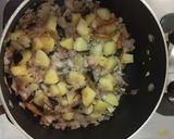 A picture of step 4 of Kande Pohe (beaten rice flakes).