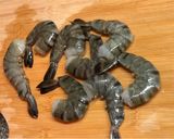 A picture of step 1 of Cheesy Baked Tiger Prawns with Yi Mein Noodles.