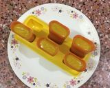A picture of step 8 of Mango Popsicles.