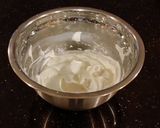 A picture of step 8 of Vanilla Layer Cake with Whipped Chocolate Ganache Filling and Whipped Coconut Cream Frosting.