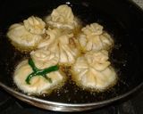 A picture of step 1 of Potli samosa with curd n corriander chutneys.