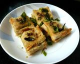 A picture of step 5 of Sandwich bread dhokla.