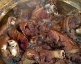 A picture of step 1 of Braised Pork Leg in Five-Spice Sauce.