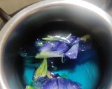 A picture of step 1 of Butterfly pea flower coffee latte.