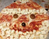 A picture of step 2 of Fluffy's festive pizza :).
