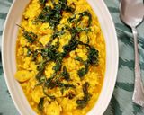 Foto del paso 7 de la receta: Arroz meloso con rodaja de pota y rúcula frita