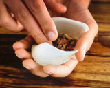 A picture of step 3 of Stuffed onion.