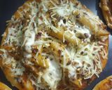 A picture of step 10 of Domino's style pasta pizza.