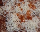 A picture of step 3 of Chorizo and Eggs in a Cheesey Tomato Sauce.