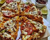 চিকেন মাখানি পিজ্জা (Chicken Makhani Pizza recipe in bengali) রেসিপি ধাপ - 12 ছবি